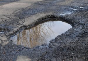 pothole with puddle